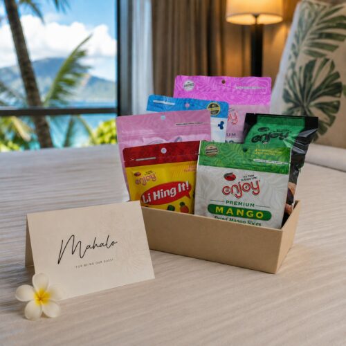 small gift set of Enjoy snacks on a hotel bed